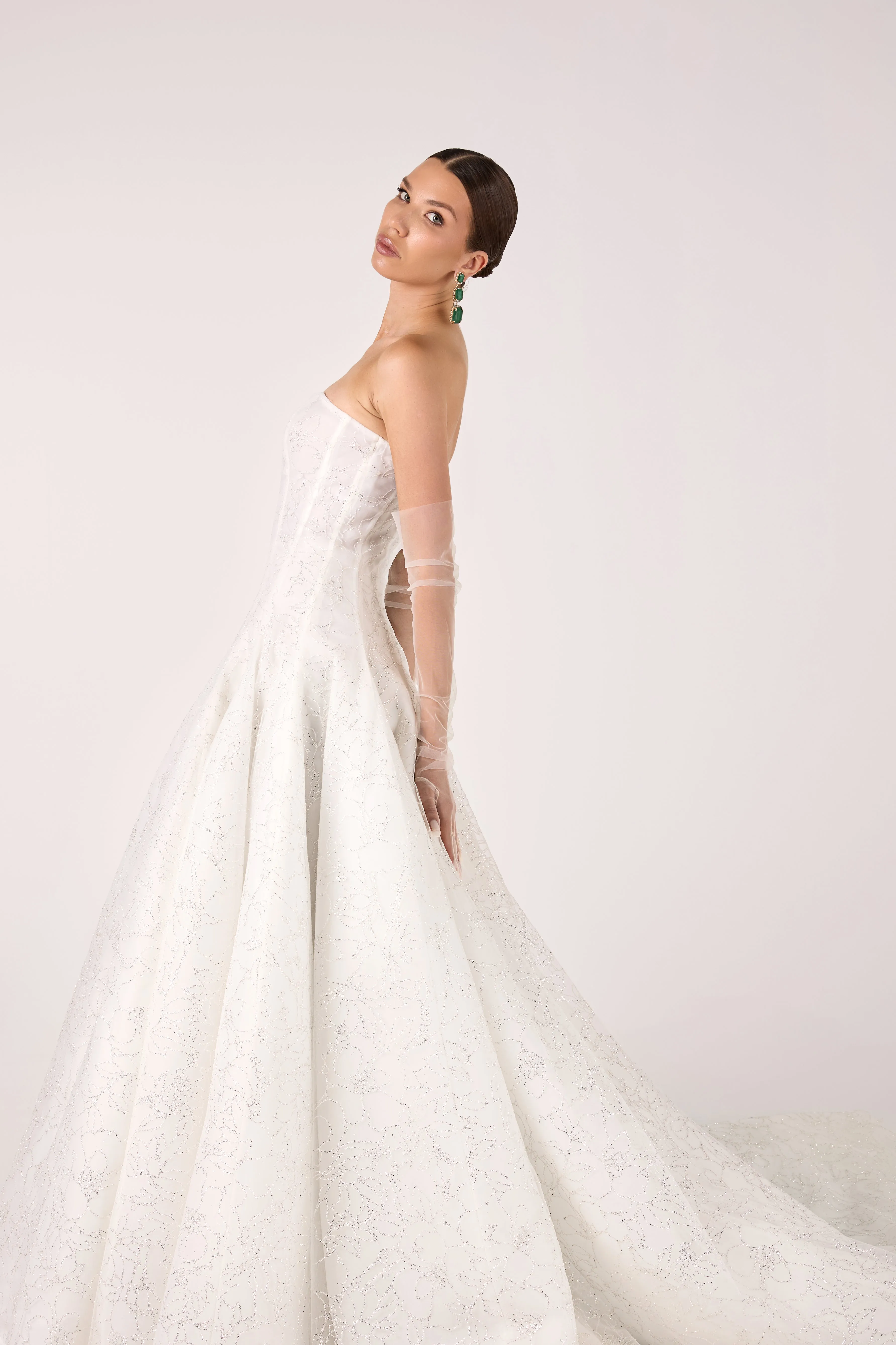 Timeless Strapless Glitter Tulle Ball Gown with Subtle Floral Pattern